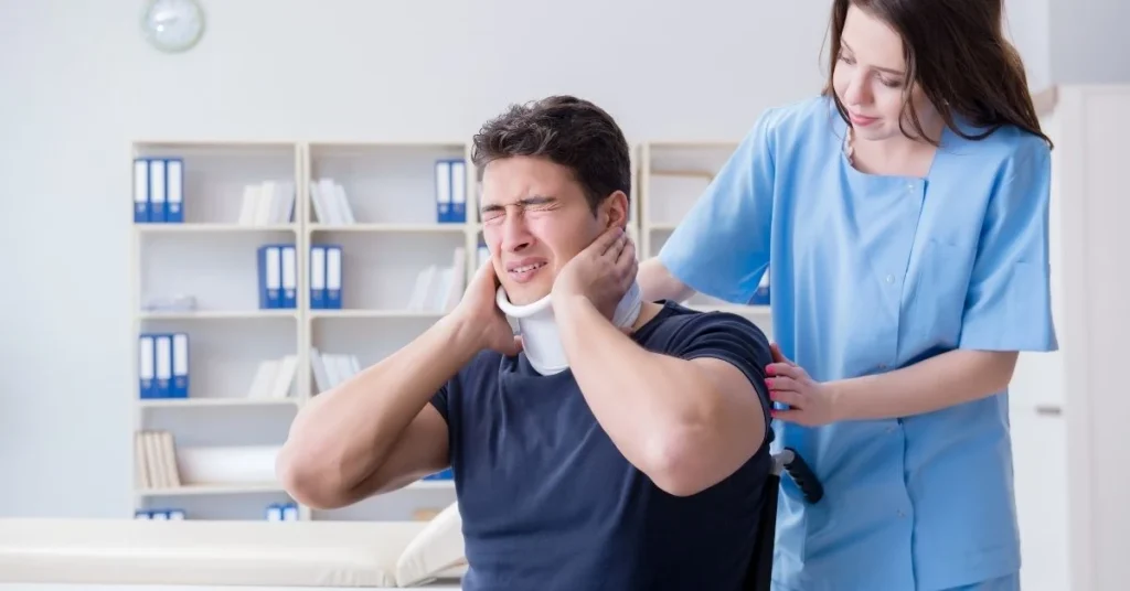 chiropractor-treating-man-with-whiplash-injury-in-clinic